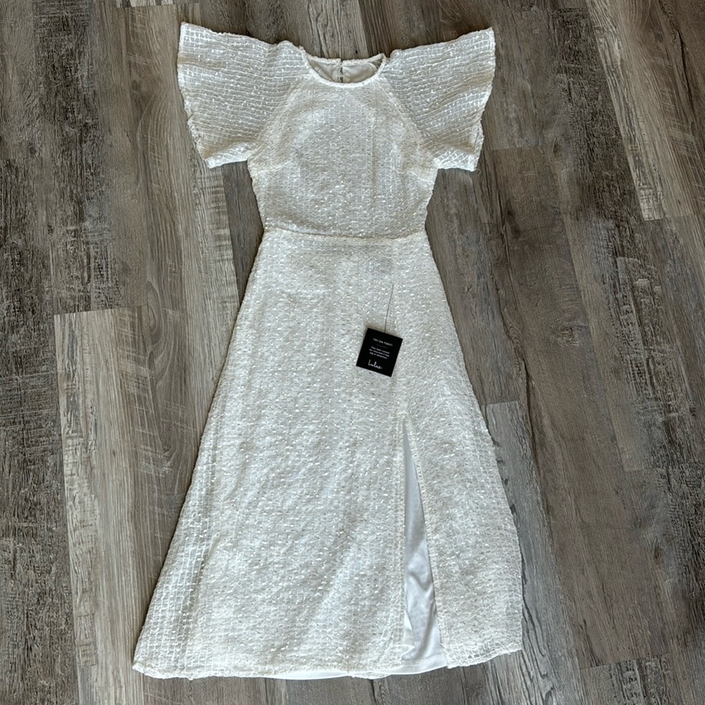 White sequenced dress.